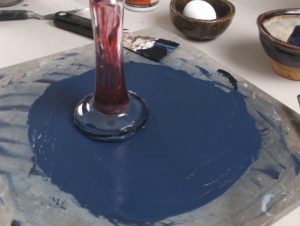 Grinding Paint with a Muller on a Marble Slab