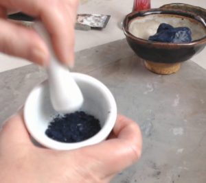 Crushing Indigo Pigment with Mortar and Pestle